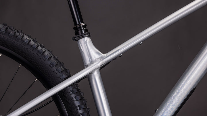 BICICLETA CUBE REACTION TM ONE RAWMETAL BLUE 2026